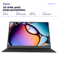 Ekran Pro 16-inch 4K laptop shown open on a white background with marketing text above it. The laptop has a matte black finish and a colorful abstract liquid display on the screen.
